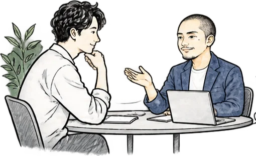打ち合わせのテーブルで、代表がお客様の話を伺っている様子